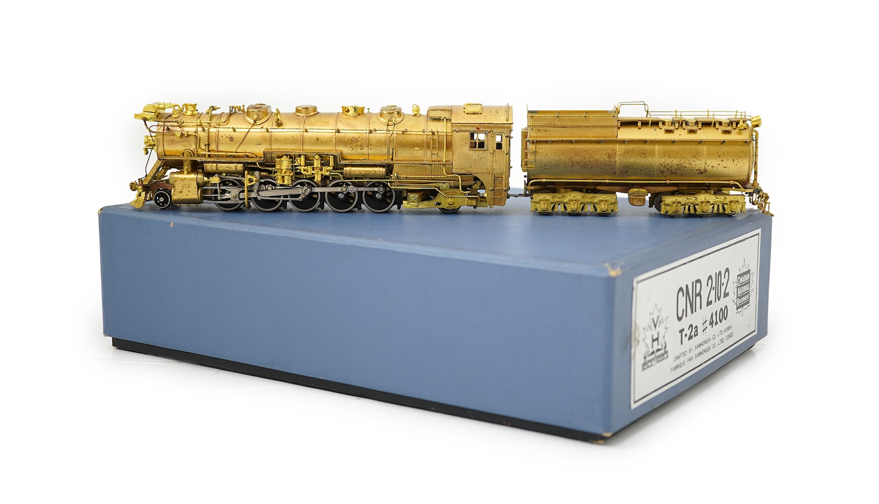 A boxed HO gauge VH Scale Models unpainted brass model of Canadian National Railways T-2a, 4100, 2-10-2 locomotive with bogie tender, powered for two rail operation.